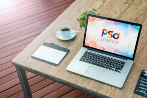 Macbook Pro on Table Mockup Free PSD   