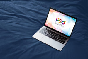 Macbook on Bed Mockup PSD   