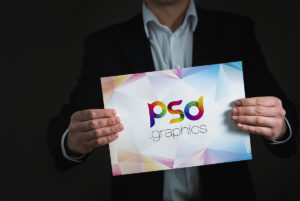 Placard in Hand Mockup Free PSD   