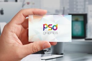 Hand Holding Business Card Mockup PSD   