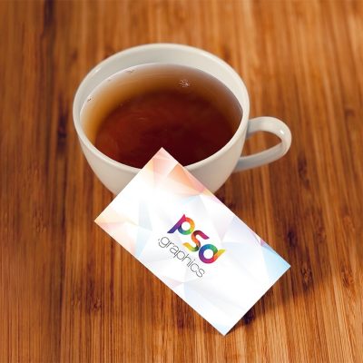Business Card Mockup Template wooden table tea cup smart object simple business card showcase psd mockup psd graphics psd professional presentation photoshop photorealistic photo realistic mockups mockup template mockup psd mockup mock-up freebie free psd free mockups free mockup free download corporate identity corporate business card corporate coffee cup card mockup card business cards mockup business cards mock-up business card with cup business card presentation business card mockup business card in hand business card business branding brand   