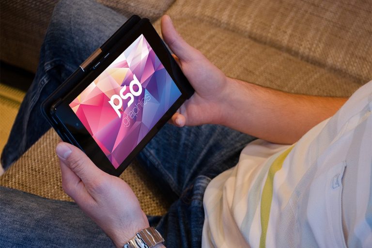 Man Holding Tablet Mockup PSD PSD Graphics