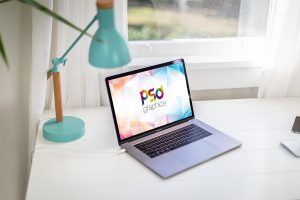 Free Macbook Pro on Table Mockup   