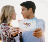 Couple Holding Invitation Card Mockup